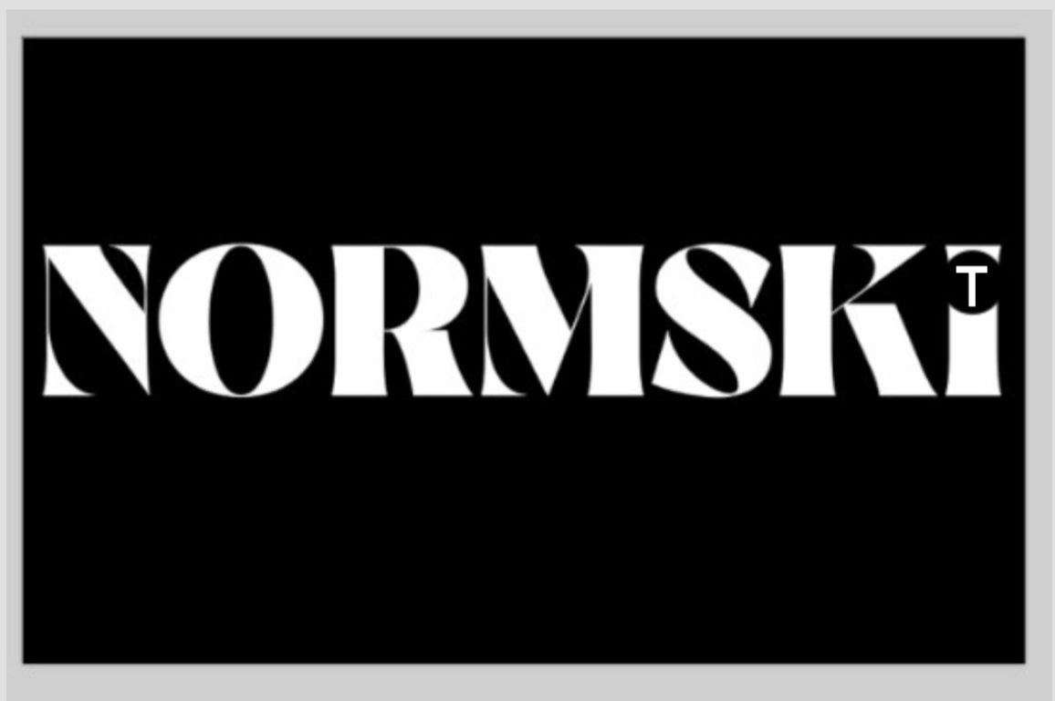 NORMSKI: Man With The Golden Shutter - Official T-Shirt